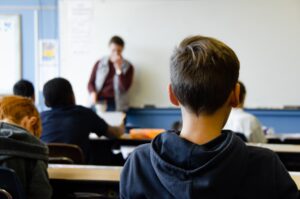 Teacher in front of his class